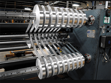 Custom Slitting & Rewinding of PTFE Tape Rolls for the Aircraft Repair and Overhaul Industry